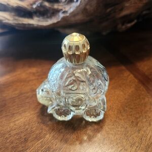 vintage Avon Magic Pumpkin Coach Cinderella glass perfume bottle. 